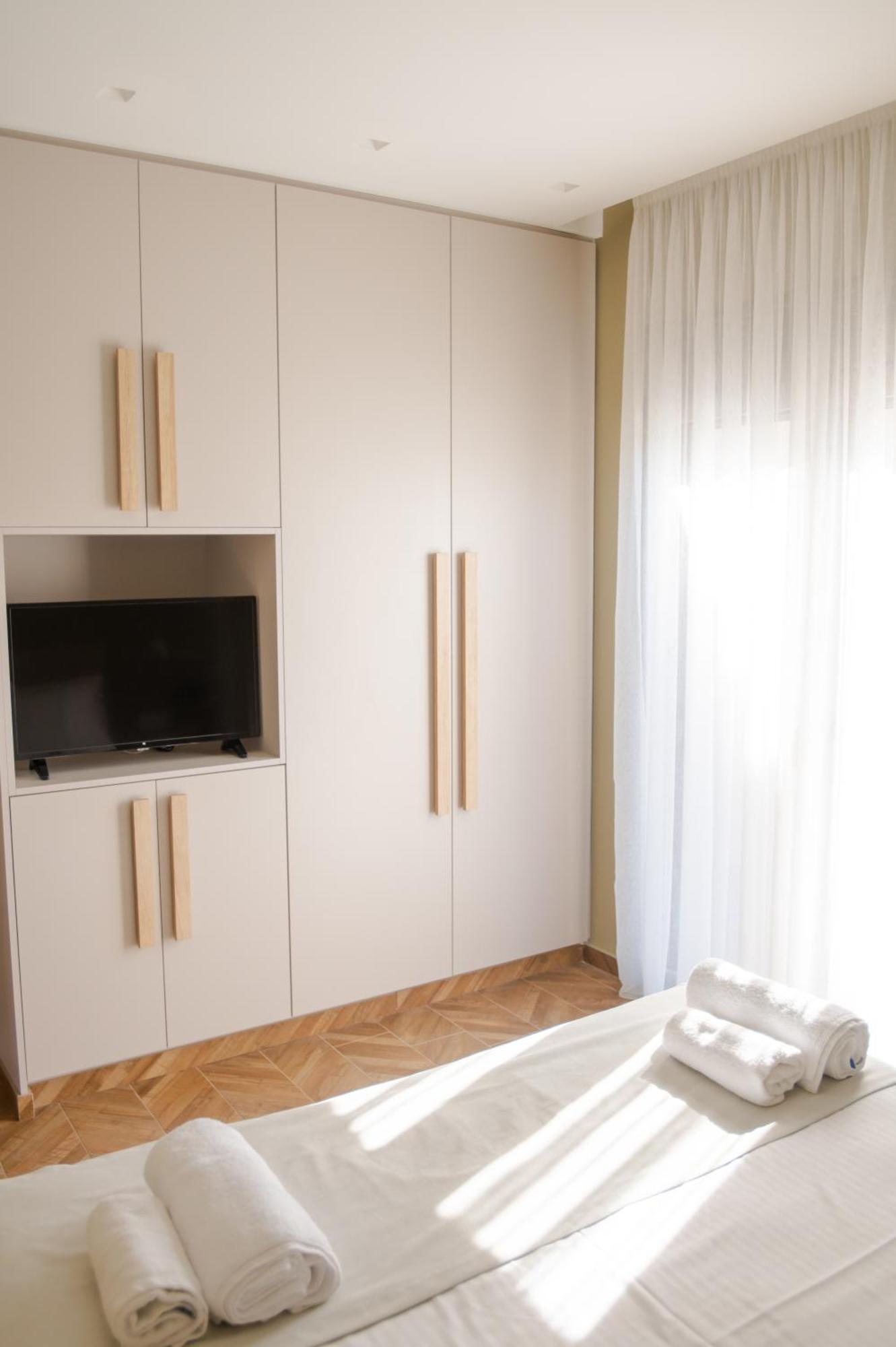 Marble Luxury Suites Karteros Luaran gambar